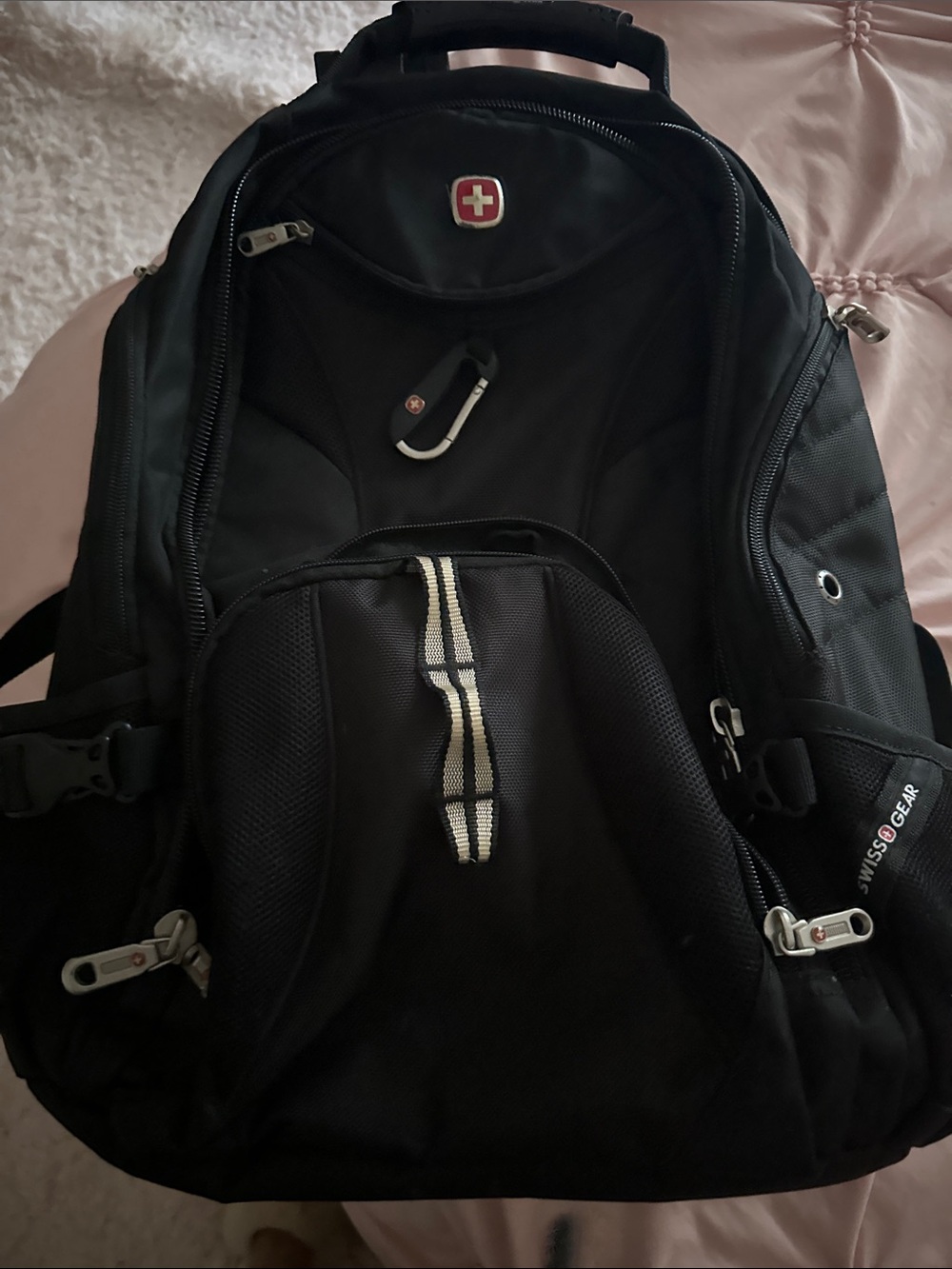 SwissGear Black Backpack with Reflective Strip and Red Logo